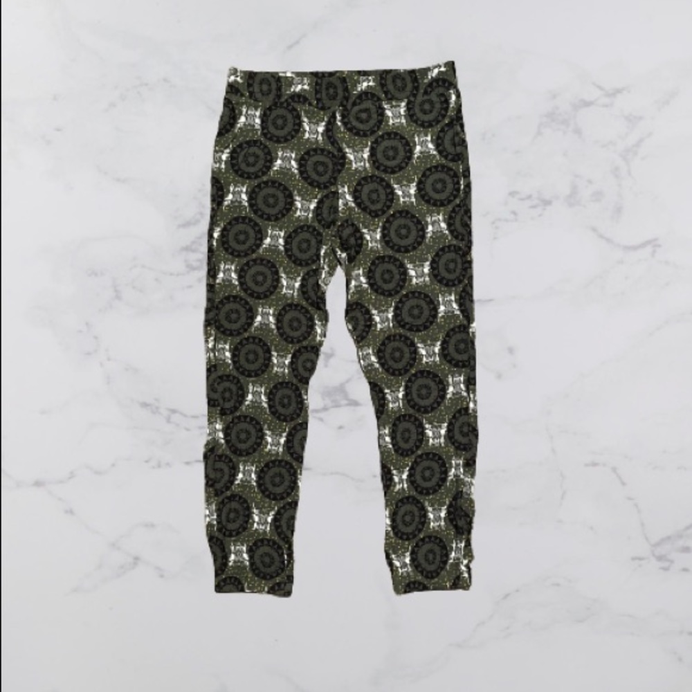Loose dark green patterned pants.